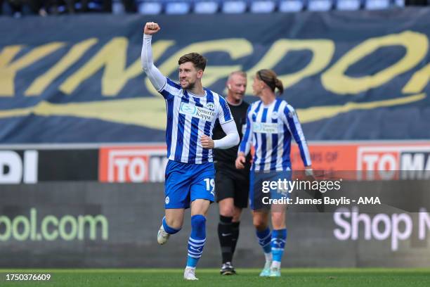 Callum Lang of Wigan Athletic celebrates after scoring a goal to make it 2-0 during the Sky Bet League One match between Wigan Athletic and...