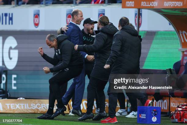 Jess Thorup, Head Coach of FC Augsburg, celebrates the team's third goal during the Bundesliga match between 1. FC Heidenheim 1846 and FC Augsburg at...