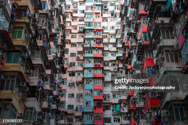 hong kong residential towers are overcrowded. - shanghai-slums stock pictures, royalty-free photos & images