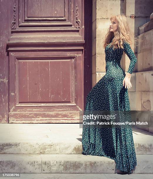 Singer Arielle Dombasle is photographed for Paris Match on July 9, 2013 in Paris, France.