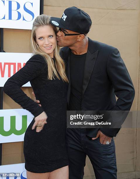 Actors A.J. Cook and Shermar Moore arrive at the CBS/CW/Showtime Television Critic Association's summer press tour party at 9900 Wilshire Blvd on...