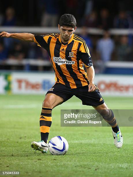 Joe Dudgeon of Hull City runs with the ball during the pre season friendly match between Peterborough United and Hull City at London Road Stadium on...