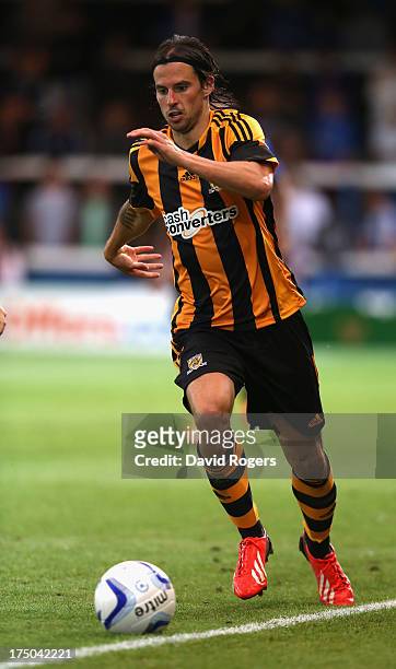 George Boyd of Hull City runs with the ball during the pre season friendly match between Peterborough United and Hull City at London Road Stadium on...