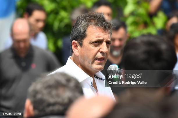 Presidential candidate for Union Por La Patria Sergio Massa speaks to the media after casting his vote during the general elections at Escuela N34...