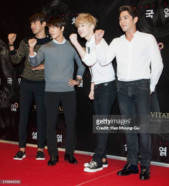 Siwon , Donghae, Henry and Kangin of South Korean boy band Super Junior attend the 'Snowpiercer' South Korea premiere at Times Square on July 29,...
