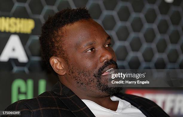 Dereck Chisora speaks during a press conference organised by boxing promoter Frank Warren at The Copper Box on July 30, 2013 in London, England.