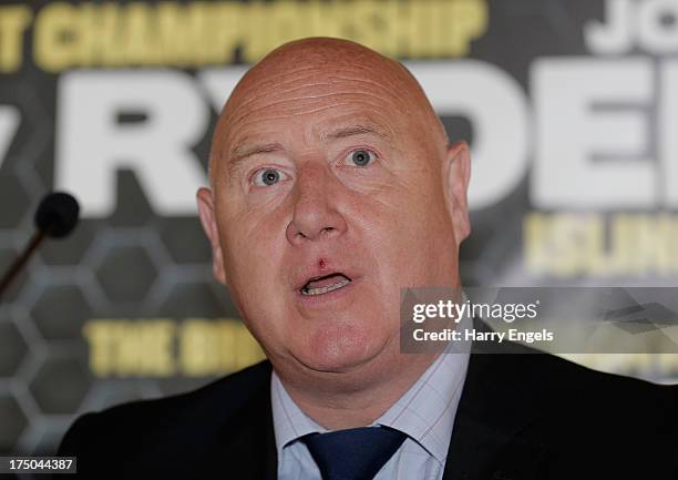 Phil Lane, Head of Sport at GLL, speaks during a press conference organized by boxing promoter Frank Warren at The Copper Box on July 30, 2013 in...