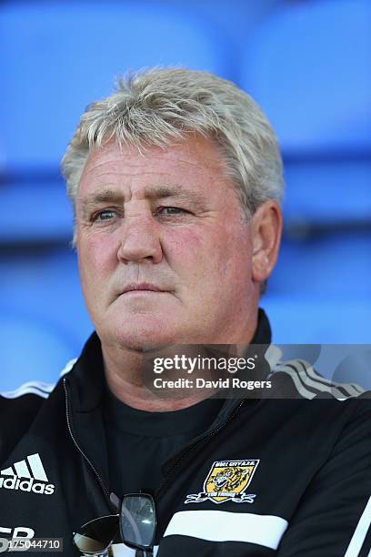 Steve Bruce, the Hull City manager, looks on during the pre season friendly match between Peterborough United and Hull City at London Road Stadium on...