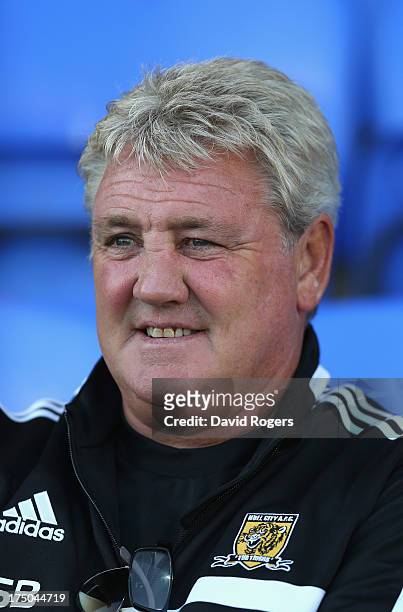 Steve Bruce, the Hull City manager, looks on during the pre season friendly match between Peterborough United and Hull City at London Road Stadium on...