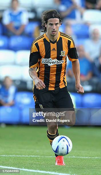 George Boyd of Hull City runs with the ball during the pre season friendly match between Peterborough United and Hull City at London Road Stadium on...