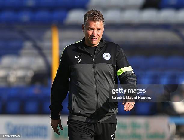 Darren Ferguson, the Peterborough United manager, looks on during the pre season friendly match between Peterborough United and Hull City at London...