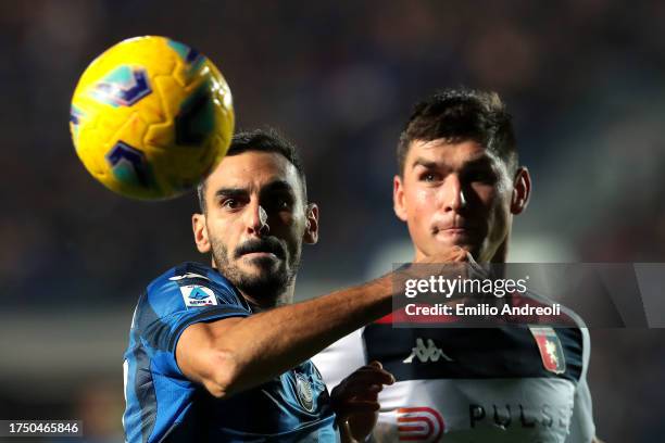 Davide Zappacosta of Atalanta BC and Ruslan Malinovskyi of Genoa CFC compete for the ball during the Serie A TIM match between Atalanta BC and Genoa...