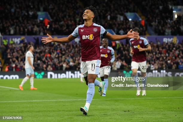 Ollie Watkins of Aston Villa celebrates after scoring his side's third goal during the Premier League match between Aston Villa and West Ham United...