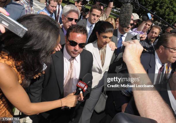 Personalities Joe Giudice and Teresa Giudice appear in court to face charges of defrauding lenders, illegally obtaining mortgages and other loans as...