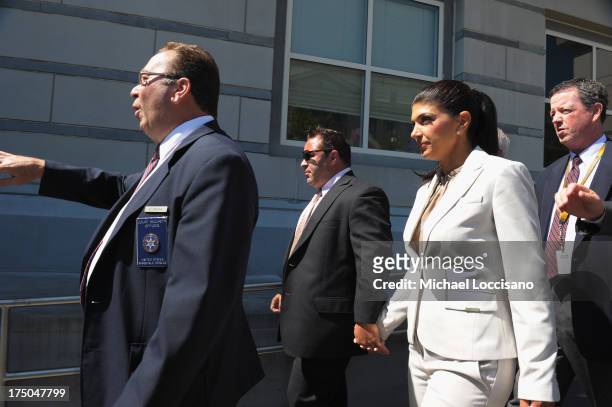 Personalities Joe Giudice and Teresa Giudice appear in court to face charges of defrauding lenders, illegally obtaining mortgages and other loans as...