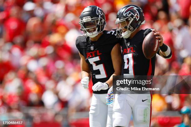 Drake London and Desmond Ridder of the Atlanta Falcons celebrate after a touchdown against the Tampa Bay Buccaneers during the first quarter of the...