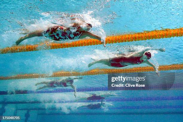 Lotte Friis of Denmark, Katie Ledecky of the USA and Mireia Belmonte Garcia compete during the Swimming Women's 1500m Freestyle Final on day eleven...