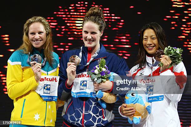 Silver medal winner Emily Seebohm, Gold medal winner Missy Franklin of the USA and Bronze medal winner Aya Terakawa of Japan celebrate on the podium...