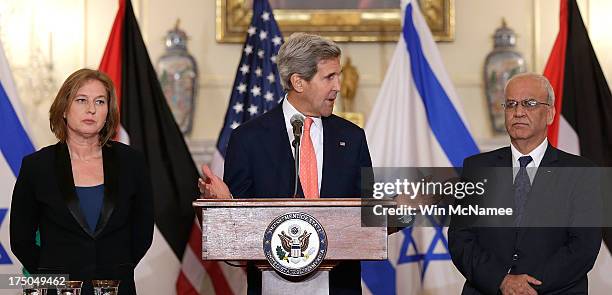 Secretary of State John Kerry makes a statement with Israeli Justice Minister Tzipi Livni and Palestinian chief negotiator Saeb Erekat during a press...