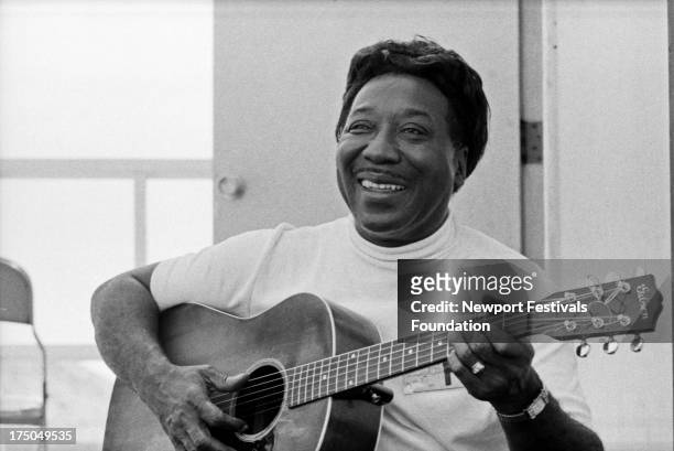 Blues guitarist, singer, and songwriter Muddy Waters performs at the Newport Folk Festival in July, 1969 in Newport, Rhode Island.