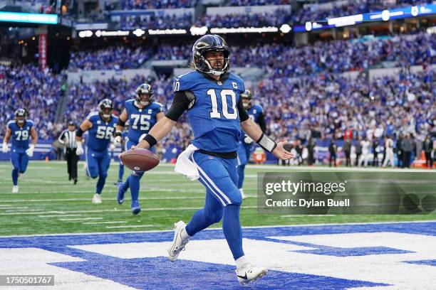 Gardner Minshew of the Indianapolis Colts reacts after scoring a rushing touchdown during the first quarter against the Cleveland Browns at Lucas Oil...