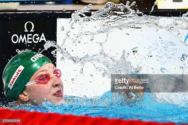 Ruta Meilutyte of Lithuania celebrates after the Swimming Women's 100m Breastroke Final on day eleven of the 15th FINA World Championships at Palau...