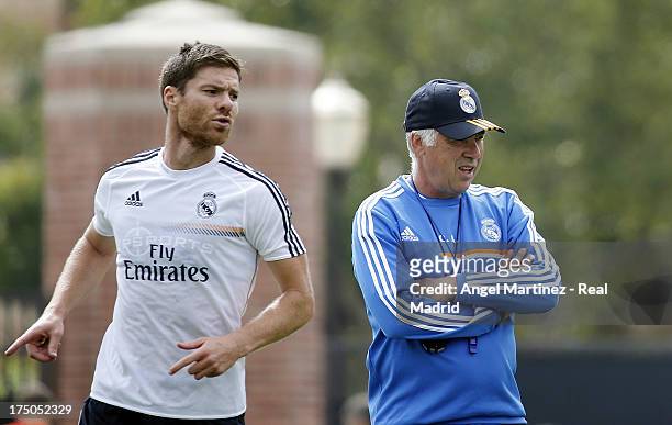 Xabi Alonso and head coach Carlo Ancelotti of Real Madrid during a training session at UCLA Campus on July 30, 2013 in Los Angeles, California.
