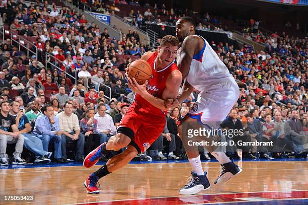 Blake Griffin of the Los Angeles Clippers drives to the basket against Arnett Moultrie of the Philadelphia 76ers at the Wells Fargo Center on...