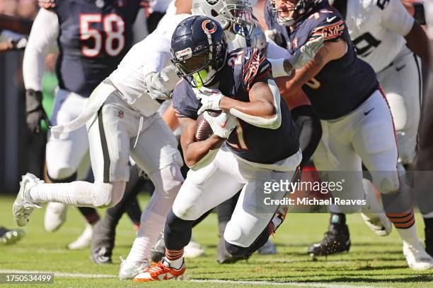 Onta Foreman of the Chicago Bears runs in for a touchdown during the second quarter against the Las Vegas Raiders at Soldier Field on October 22,...