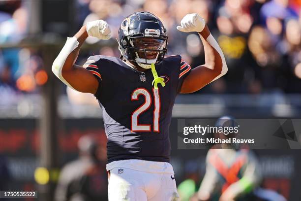 Onta Foreman of the Chicago Bears celebrates a touchdown during the second quarter against the Las Vegas Raiders at Soldier Field on October 22, 2023...