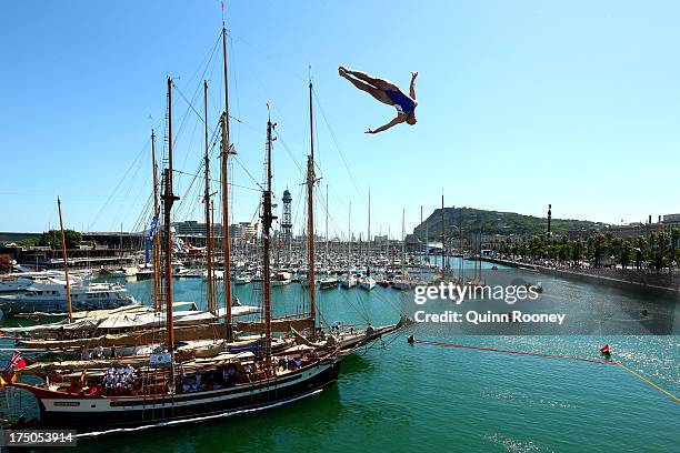 Ginger Huber of USA competes during the Women's 20m High Diving on day eleven of the 15th FINA World Championships at Moll de la Fusta on July 30,...