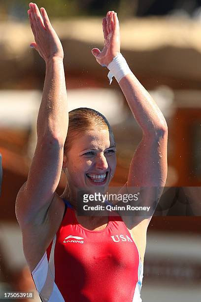 Gold medal winner Cesilie Carlton of the USA celebrates after the Women's 20m High Diving on day eleven of the 15th FINA World Championships at Moll...