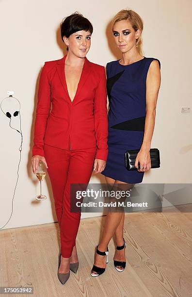 Alexandra Roach and Vanessa Kirby attend a private view of 'HUGO: Red Never Follows', celebrating 20 years of Hugo Boss, at the Saatchi Gallery on...
