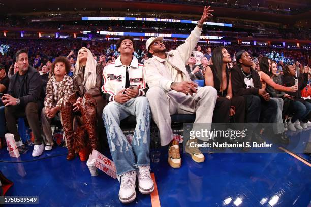Kiyan Anthony and Carmelo Anthony attend the game between the Boston Celtics and the New York Knicks on October 25, 2023 at Madison Square Garden in...