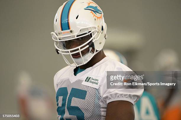 Dolphins defensive end Dion Jordan practices during Miami Dolphins training camp on July 27, 2013 in Davie, Florida.