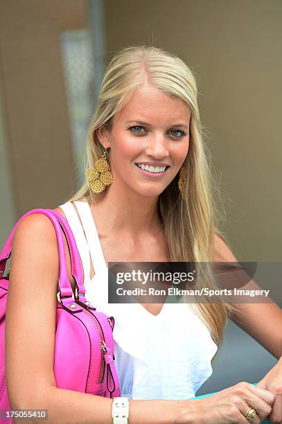 Lauren Tannehill, wife of Dolphins quarterback Ryan Tannehill looks on during Miami Dolphins training camp on July 27, 2013 in Davie, Florida.