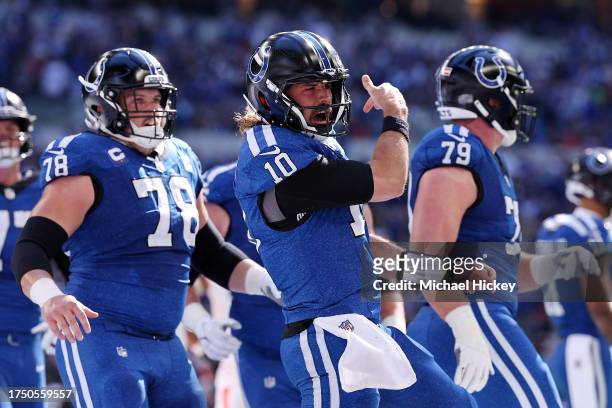 Gardner Minshew of the Indianapolis Colts celebrates after a rushing touchdown during the second quarter against the Cleveland Browns at Lucas Oil...