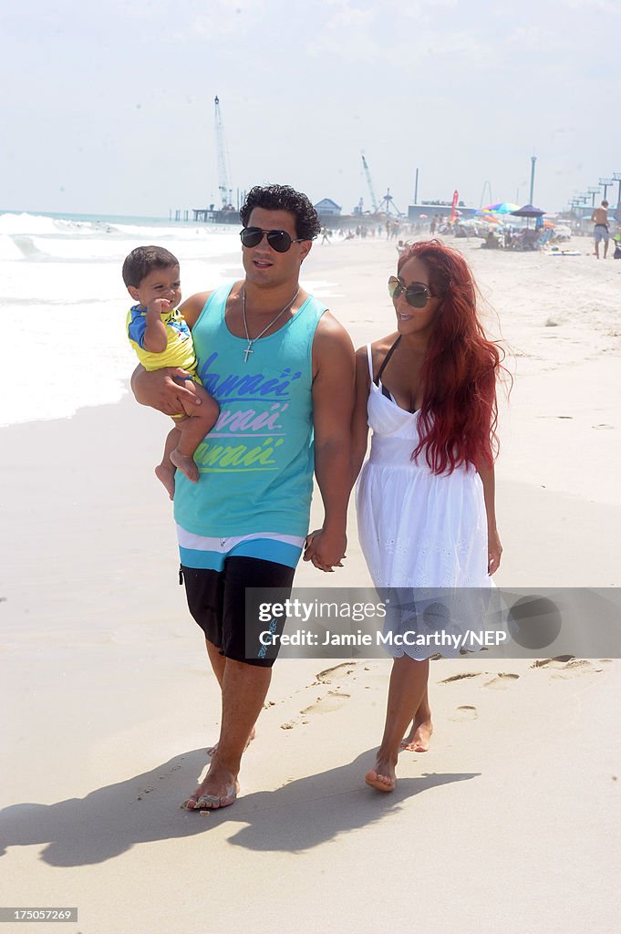 Nicole "Snooki" Polizzi And Jionni LaValle Enjoy A Day At The Beach With Their Son Lorenzo Dominic LaValle