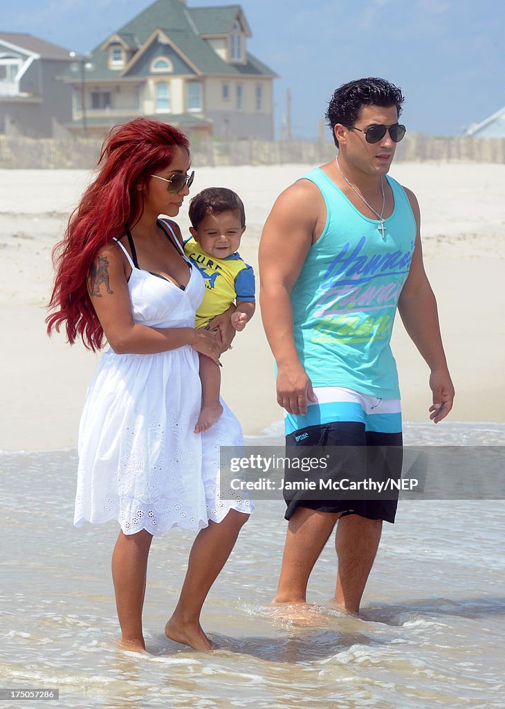 Nicole "Snooki" Polizzi And Jionni LaValle Enjoy A Day At The Beach With Their Son Lorenzo Dominic LaValle