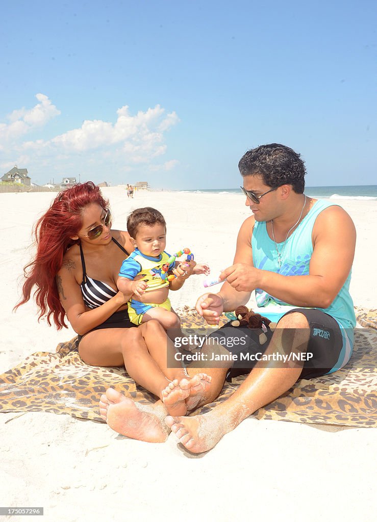 Nicole "Snooki" Polizzi And Jionni LaValle Enjoy A Day At The Beach With Their Son Lorenzo Dominic LaValle