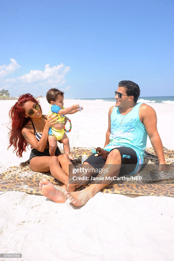 Nicole "Snooki" Polizzi And Jionni LaValle Enjoy A Day At The Beach With Their Son Lorenzo Dominic LaValle