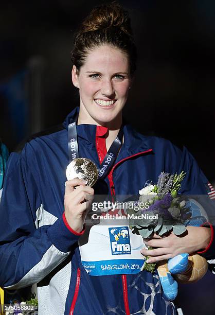 Missy Franklin of USA posses with her gold medal from final of The Women's 100m Brackstroke at the Palau Sant Jordi on day eleven of the 15th FINA...