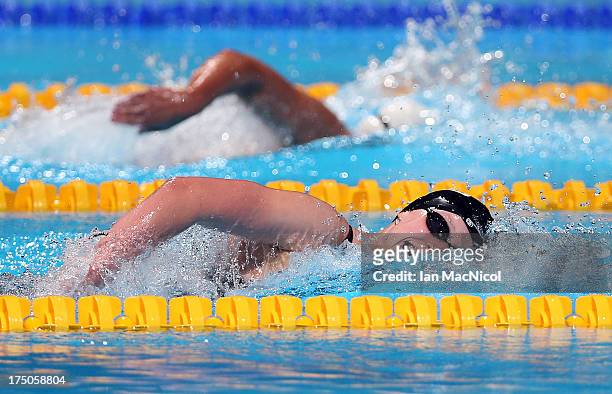 Katie Ledecky of USA on her way to winning the final of The Women's 1500m Freestyleat the Palau Sant Jordi on day eleven of the 15th FINA World...