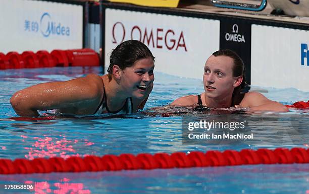 Lotte Friis of Denmark congartulates Katie Ledecky of USA who set a a new world record and wins the final of The Women's 1500m Freestyle at the Palau...