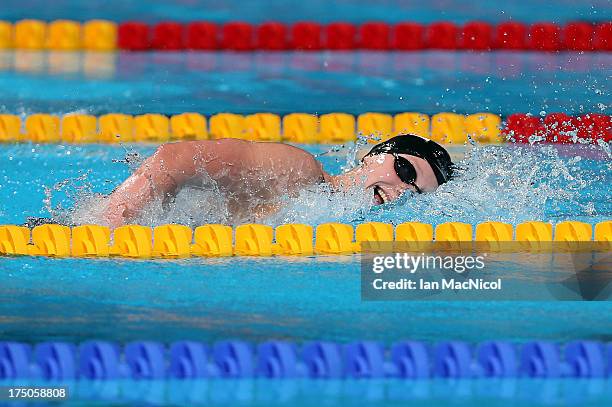 Katie Ledecky of USA on her way to winning the final of The Women's 1500m Freestyleat the Palau Sant Jordi on day eleven of the 15th FINA World...