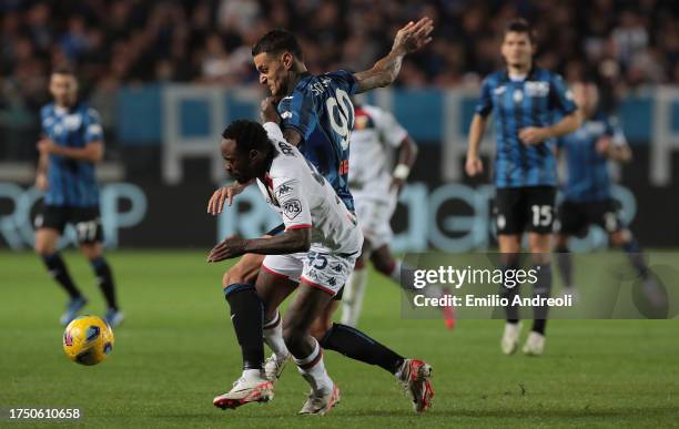 Gianluca Scamacca of Atalanta BC competes for the ball with Ridgeciano Haps of Genoa CFC during the Serie A TIM match between Atalanta BC and Genoa...