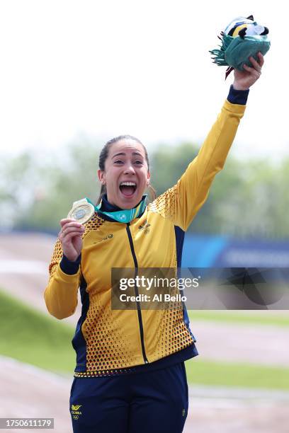 Mariana Pajon of Team Colombia celebrates her gold medal in the podium of Women's BMX Racing at Parque Peñalolen on Day 2 of Santiago 2023 Pan Am...