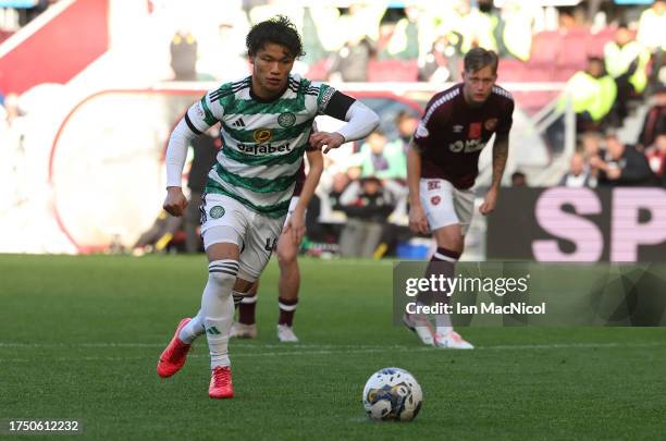 Reo Hatae of Celtic takes a penalty during the Cinch Scottish Premiership match between Heart of Midlothian and Celtic FC at Tynecastle Park on...