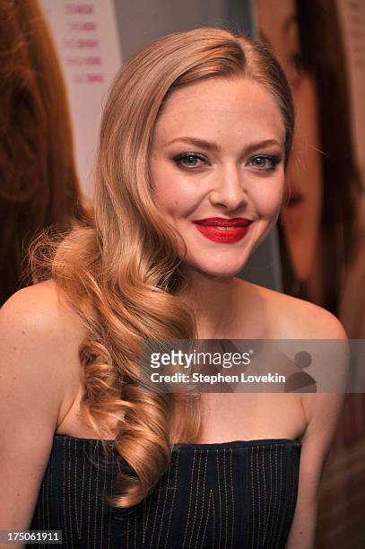 Actress Amanda Seyfried attends The Cinema Society and MCM with Grey Goose screening of Radius TWC's "Lovelace" at MoMA on July 30, 2013 in New York...