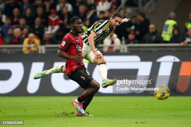 Adrien Rabiot of Juventus shoots during the Serie A TIM match between AC Milan and Juventus at Stadio Giuseppe Meazza on October 22, 2023 in Milan,...